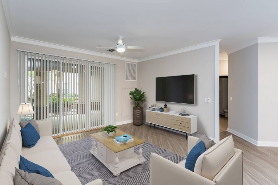 Attain Downtown East apartment homes with Modern living room with beige sofas, blue accents, TV on the wall, and large windows with vertical blinds.